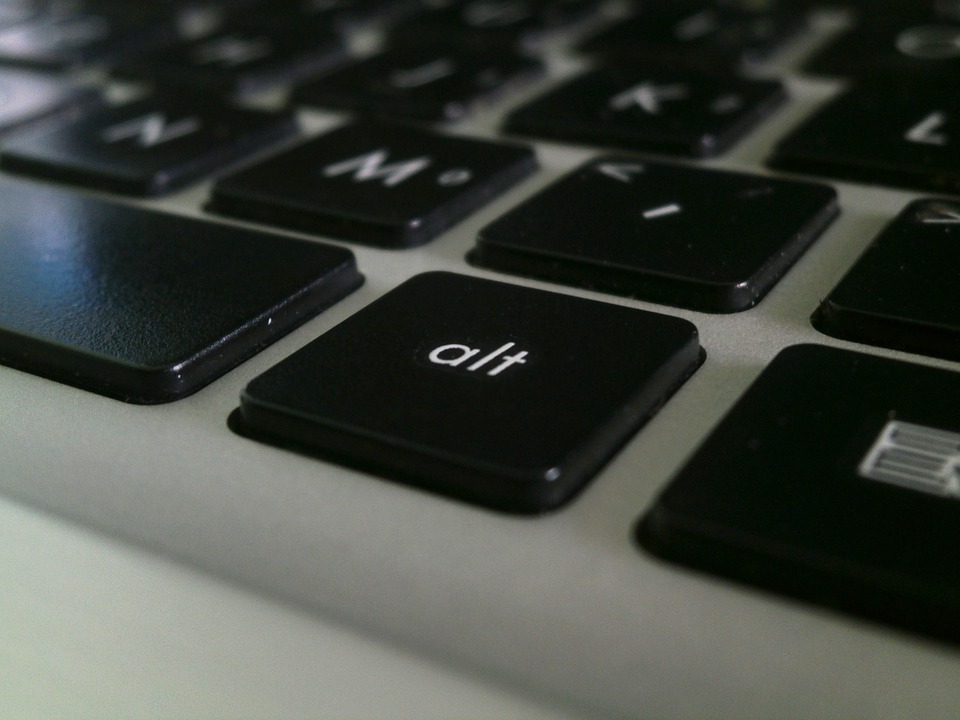 An Alt key on a black keyboard. This is the image's alt text!